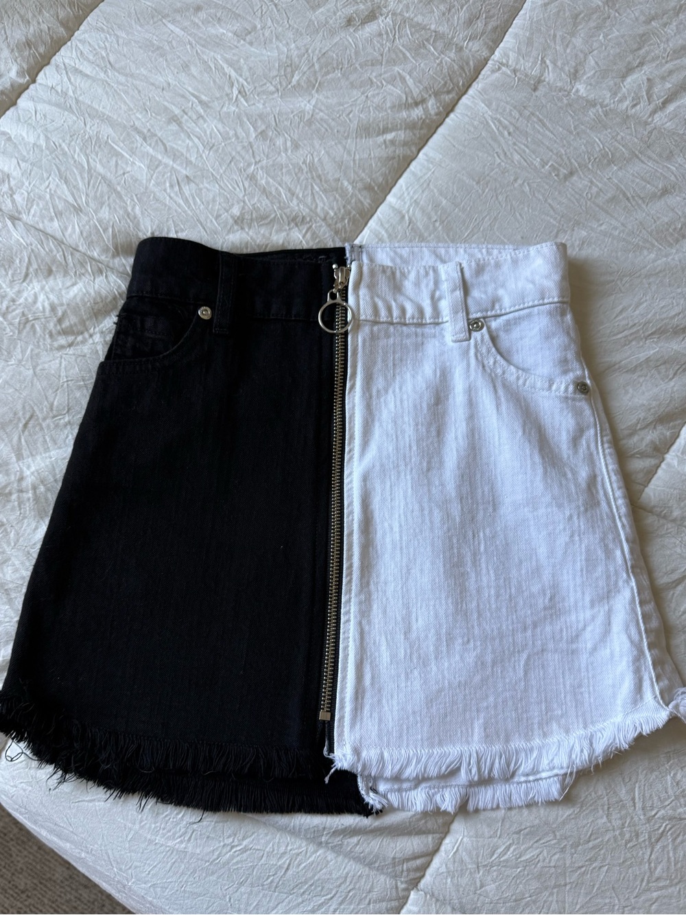 REVICE Two-Tone Black and White Mini Skirt with Front Zip Ring